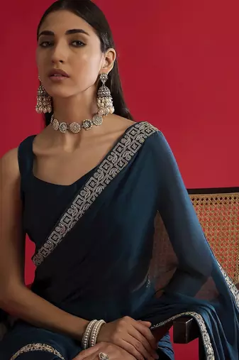 blue sequinned satin saree