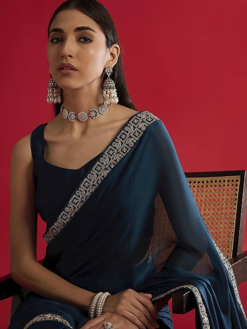 blue sequinned satin saree