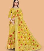 yellow floral embroidered net saree