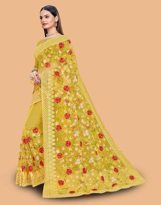 yellow floral embroidered net saree 3