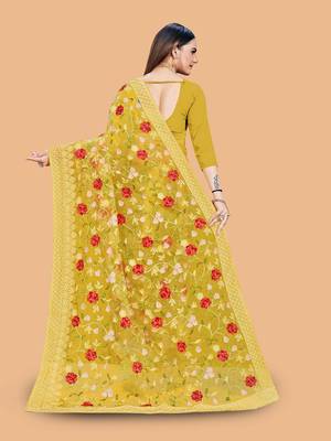 yellow floral embroidered net saree 4