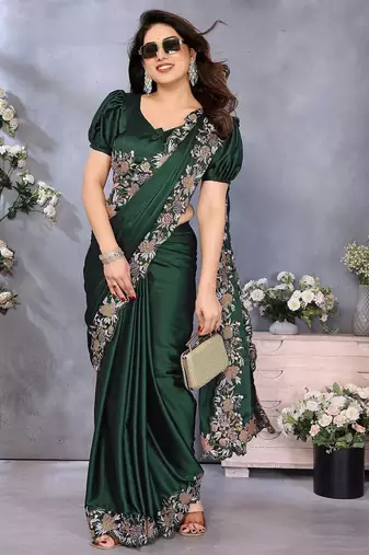 green ethnic motifs embroidered satin saree