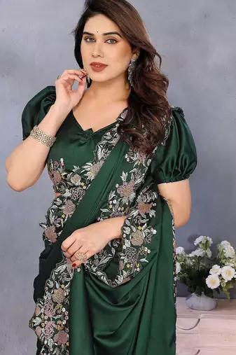 green ethnic motifs embroidered satin saree