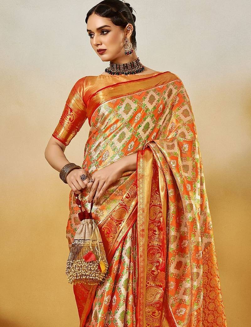Orange women ethnic motifs printed zari kanjeevaram saree