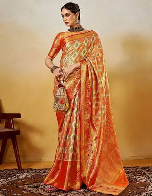 Orange women ethnic motifs printed zari kanjeevaram saree 2