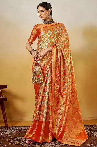 Orange women ethnic motifs printed zari kanjeevaram saree