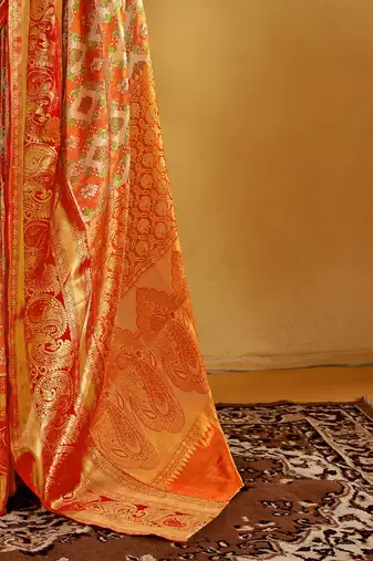 Orange women ethnic motifs printed zari kanjeevaram saree