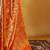 Orange women ethnic motifs printed zari kanjeevaram saree
