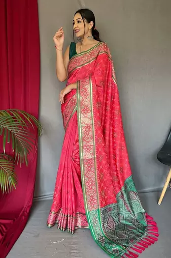pink ethnic motif printed zari patola saree