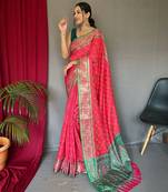 pink ethnic motif printed zari patola saree