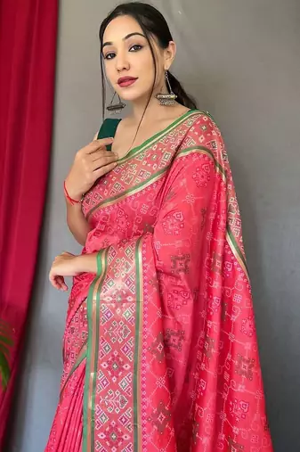 pink ethnic motif printed zari patola saree