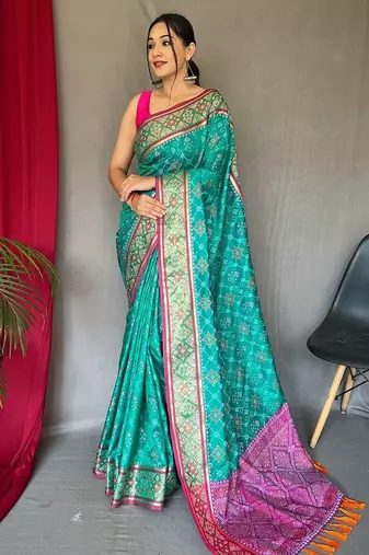 teal ethnic motifs silk blend patola zari saree with tassel