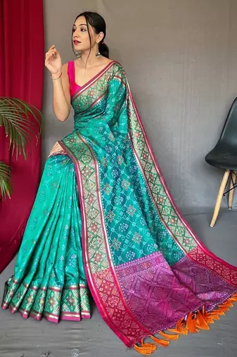 teal ethnic motifs silk blend patola zari saree with tassel