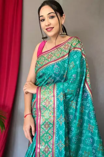 teal ethnic motifs silk blend patola zari saree with tassel