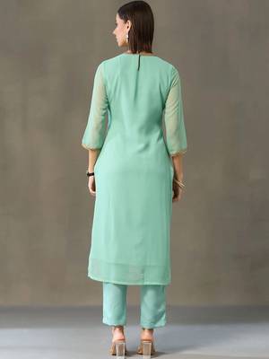 smart women embroidered kurta with trousers 7