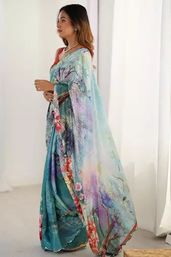 Sea green floral kutchi embroidery silk blend saree
