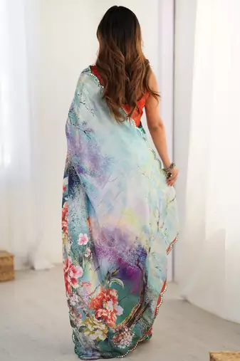 Sea green floral kutchi embroidery silk blend saree
