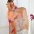 Orange floral kutchi embroidery silk blend saree