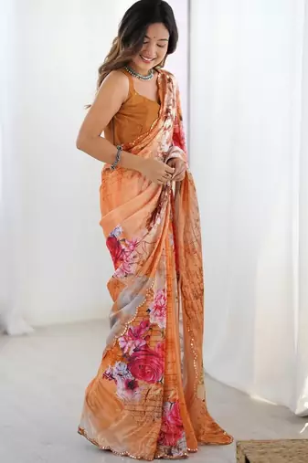 Orange floral kutchi embroidery silk blend saree