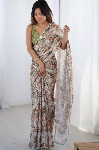 Beige floral kutchi embroidery silk blend saree