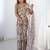 Beige floral kutchi embroidery silk blend saree
