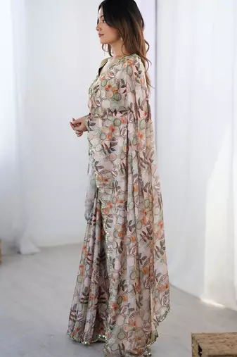 Beige floral kutchi embroidery silk blend saree