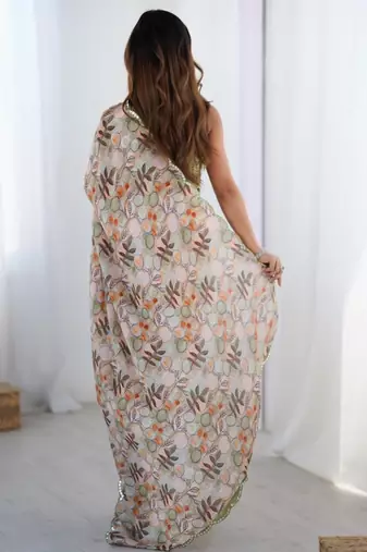 Beige floral kutchi embroidery silk blend saree