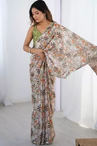 Beige floral kutchi embroidery silk blend saree