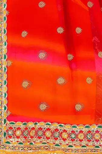 red ethnic motifs printed & embroidered poly georgette bandhani saree