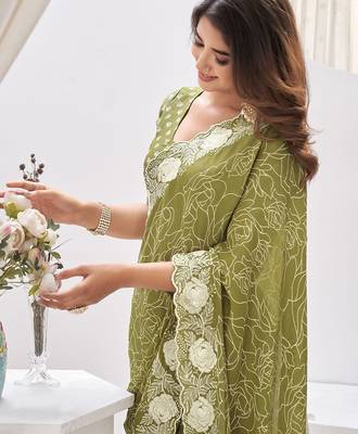 green abstract printed embroidered saree with blouse piece 1