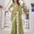 green abstract printed embroidered saree with blouse piece