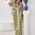 green abstract printed embroidered saree with blouse piece