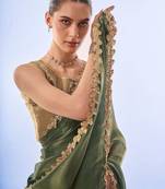 green sequinned organza saree