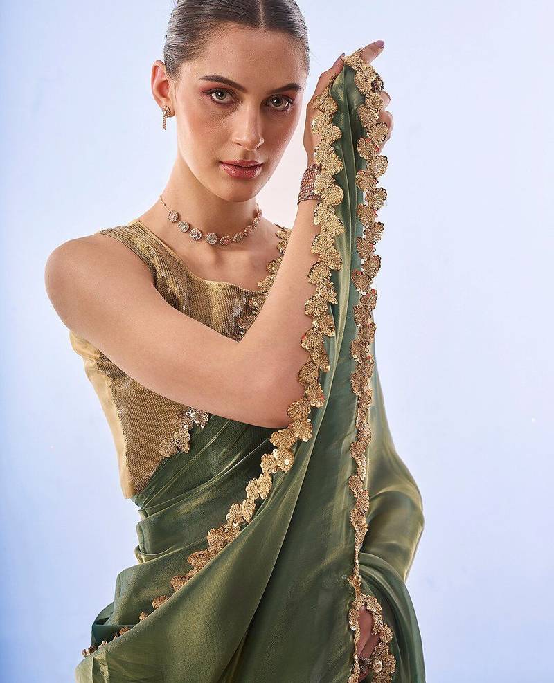 green sequinned organza saree