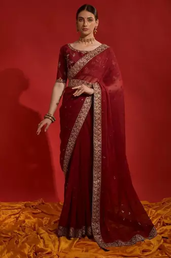 Red ethnic motifs sequinned  saree