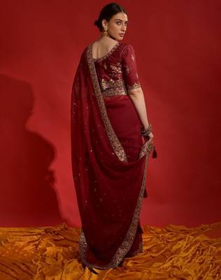 Red ethnic motifs sequinned  saree 3