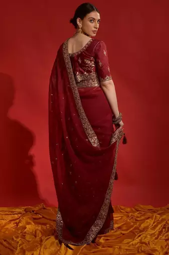 Red ethnic motifs sequinned  saree