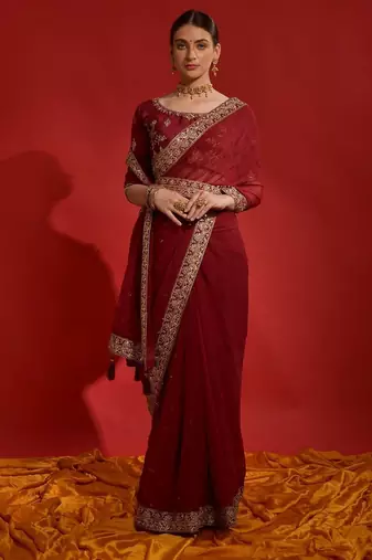Red ethnic motifs sequinned  saree