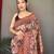 brown ethnic motif printed saree