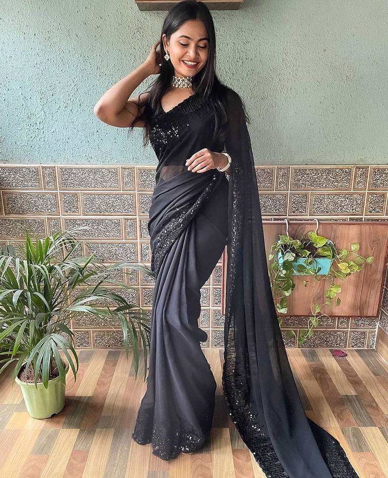 black sequinned poly georgette saree with blouse piece