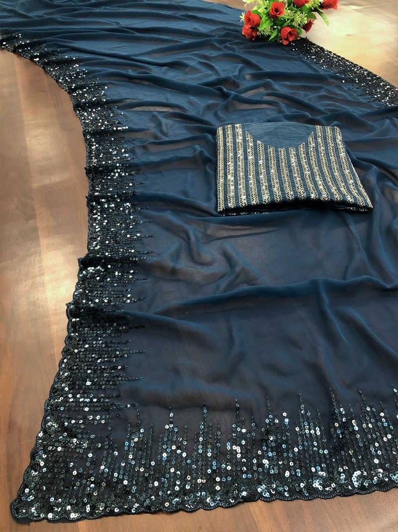 teal sequinned poly georgette saree with blouse piece