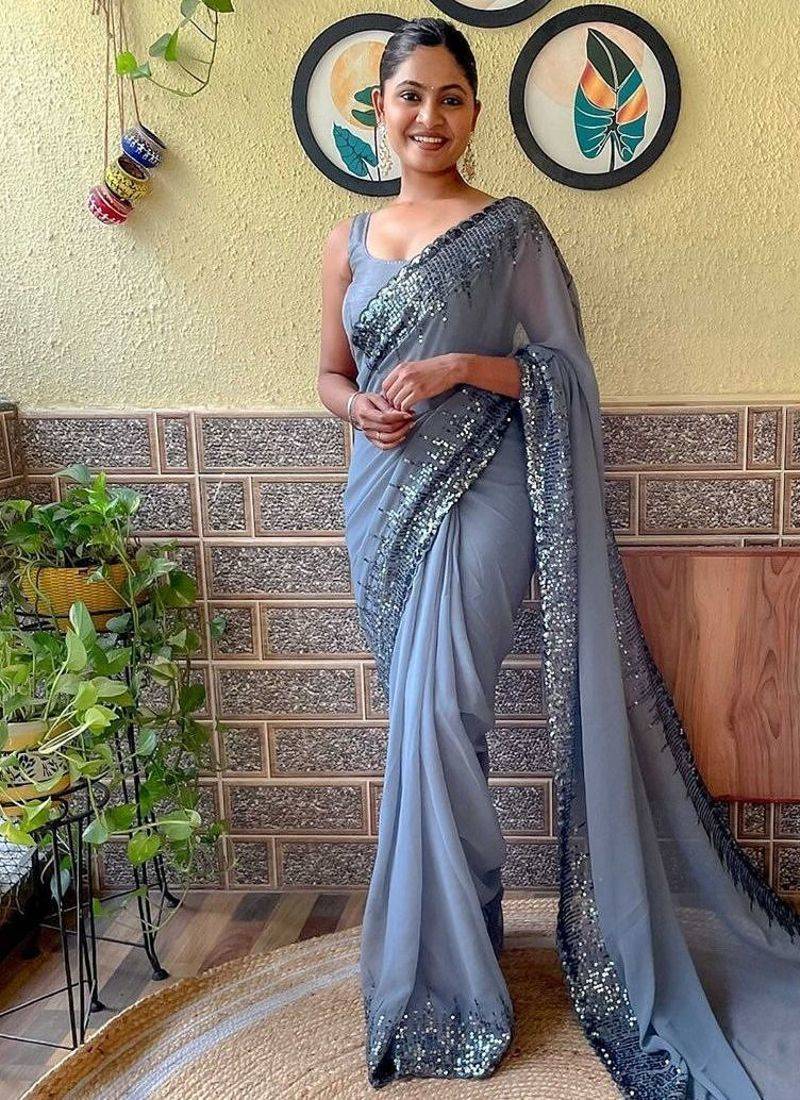 grey sequinned poly georgette saree with blouse piece
