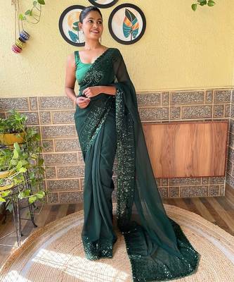 green sequinned poly georgette saree with blouse piece 1
