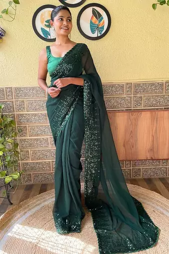 green sequinned poly georgette saree with blouse piece