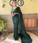 green sequinned poly georgette saree with blouse piece