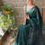 green sequinned poly georgette saree with blouse piece