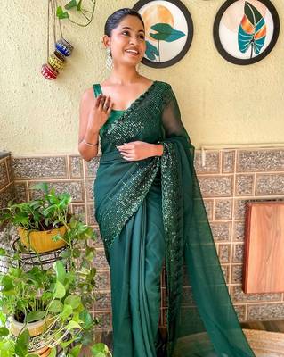 green sequinned poly georgette saree with blouse piece 3