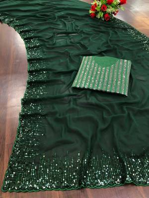 green sequinned poly georgette saree with blouse piece 4
