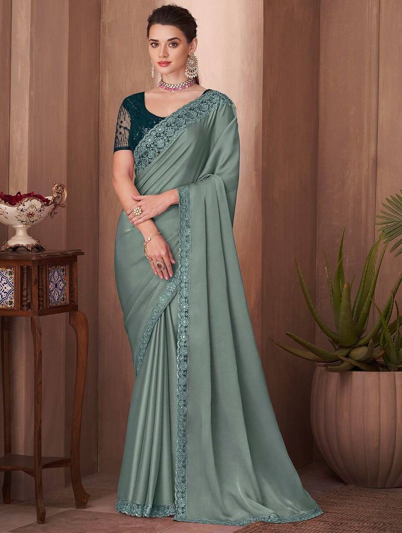 sea_green sea green embellished sequinned border saree