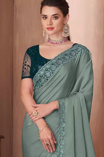 sea_green sea green embellished sequinned border saree